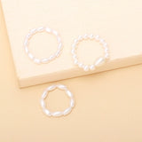 Shaped pearl elastic ring