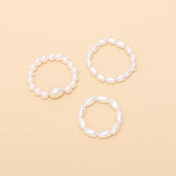 Shaped pearl elastic ring