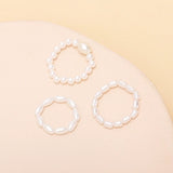 Shaped pearl elastic ring