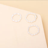 Shaped pearl elastic ring