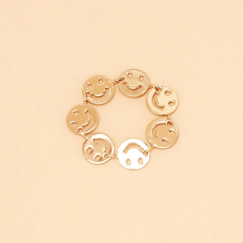 A few sequined smiley face rings