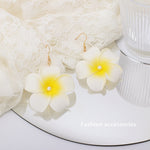 national wind pearl frangipani earrings