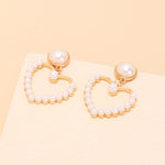 Geometric circle love pearl earrings