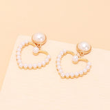 Geometric circle love pearl earrings